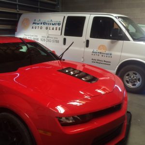 red camero in garage